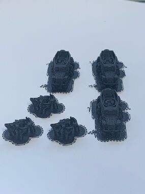 3D Printed Miniature Tanks and Turrets in Black